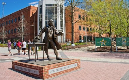 GMU board agrees to cut DEI programs while unanimously approving raise for embattled president