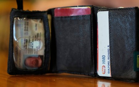 Mechanic finds Ford assembly worker's lost wallet in vehicle hood from 11 years ago