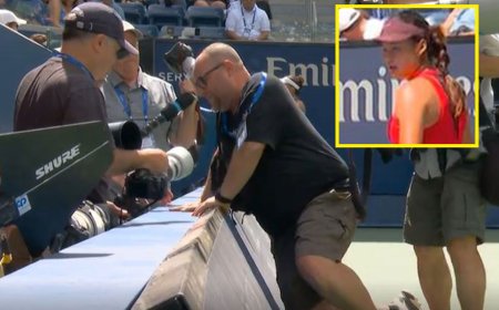 ‘He’s stacked it’ – Emma Raducanu’s US Open win stopped after cameraman falls over hoardings