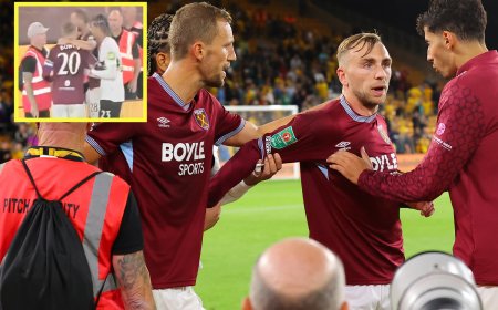 Jarrod Bowen apologises as he’s held back by teammates after argument with West Ham fans
