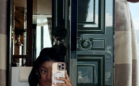 Simone Biles Shows Off Abs and Belly Button Piercing in Crop Top and Pants