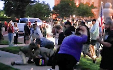 Video captures fight erupting at Charlie Kirk vigil after activist reportedly shouts profanity at crowd