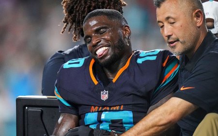 Dolphins star Tyreek Hill carted off field after gruesome knee injury, rushed to hospital