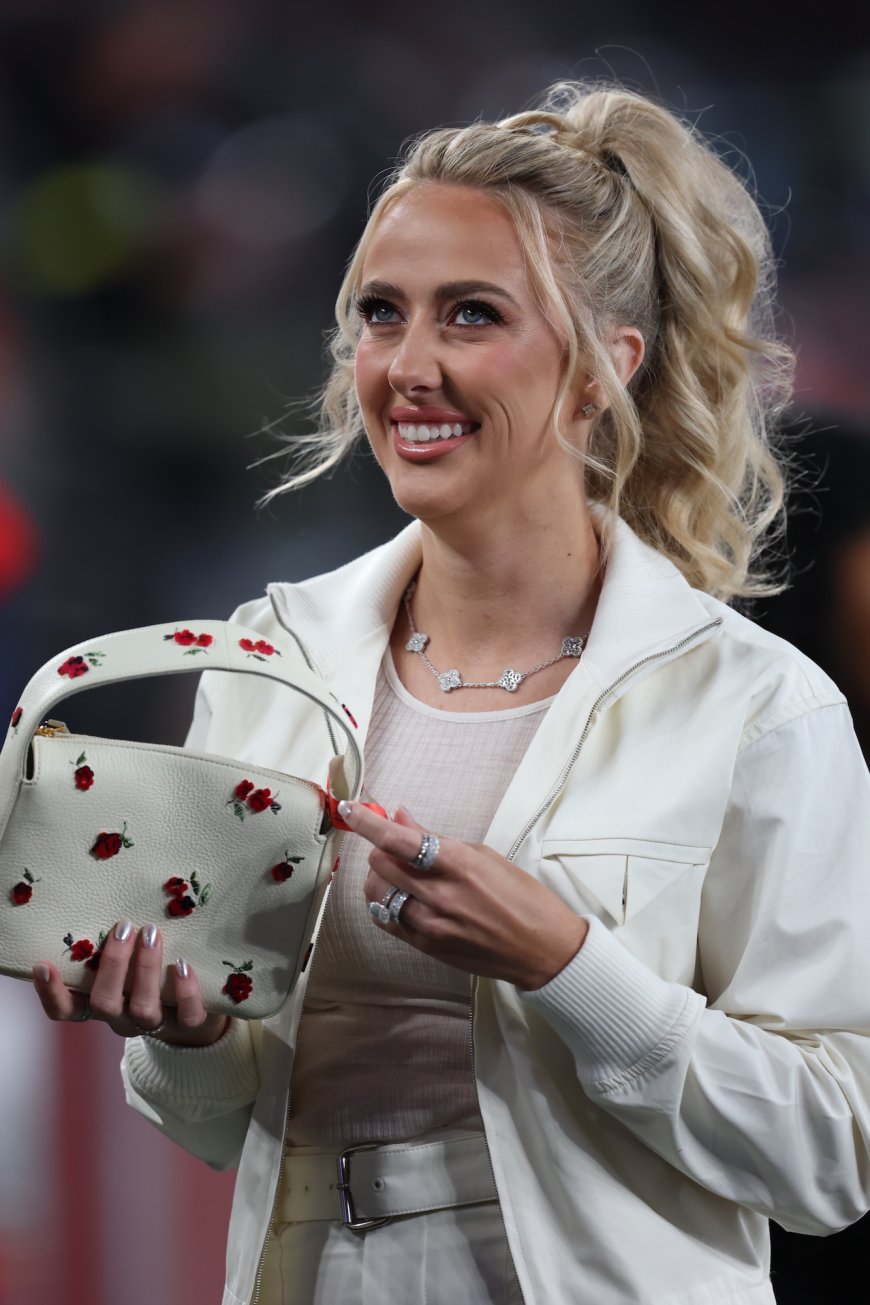 Brittany Mahomes Poses With Pat Mahomes Sr In All-White Outfit at SNF Game