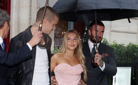 貝克漢摟腰又打傘變女兒保鑣　「貝嫂」拎愛馬仕上班氣場超強