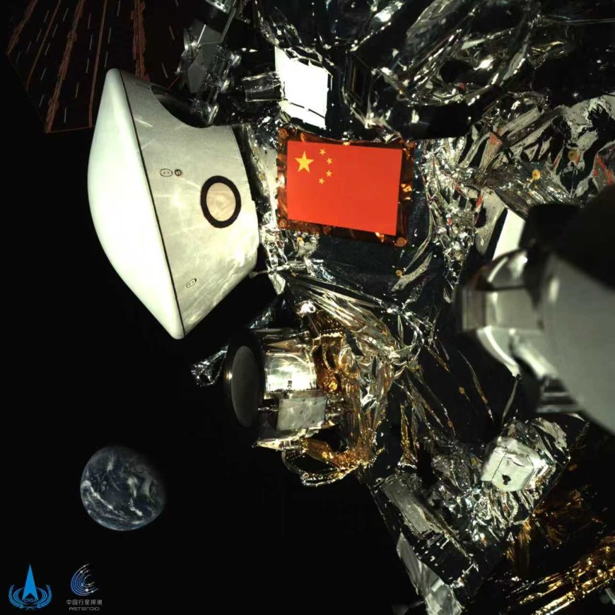 国家航天局发布天问二号探测器与地球合影,五星红旗闪耀太空