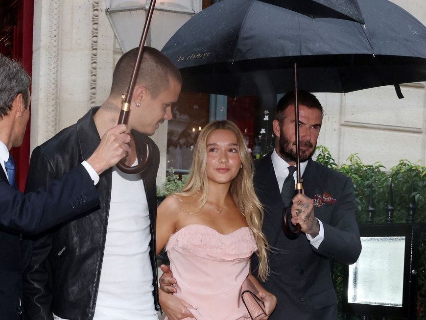 貝克漢摟腰又打傘變女兒保鑣　「貝嫂」拎愛馬仕上班氣場超強