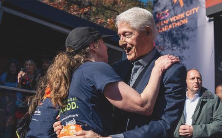 Bill Clinton spotted at NYC Marathon with bandaged nose while cheering on daughter Chelsea