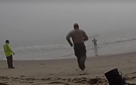 LA deputies caught on camera racing into foggy ocean to rescue disoriented paragliders