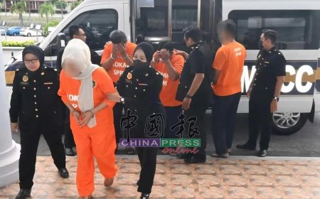 15年涉收“保护费”逾百万令吉 马国三移民局官员被控