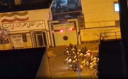 Armed Iranian protesters battle police in Tehran streets as Trump warns of forceful US response