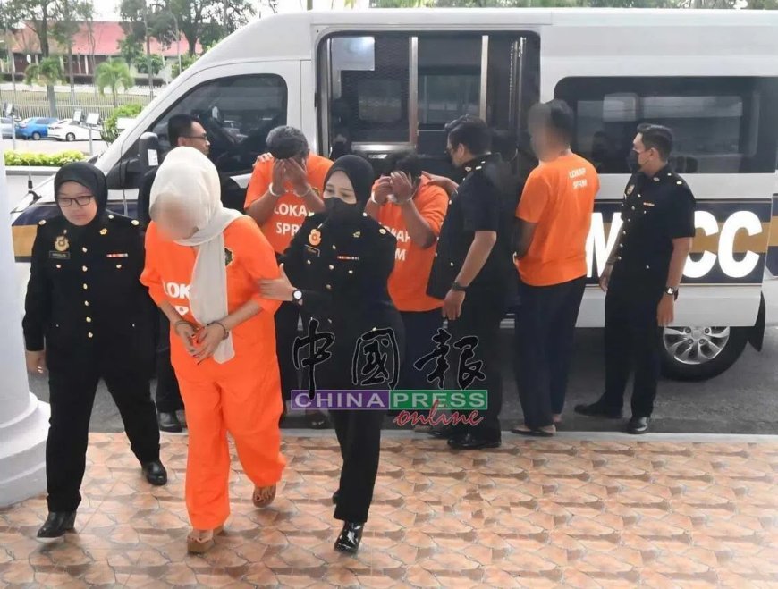 15年涉收“保护费”逾百万令吉 马国三移民局官员被控