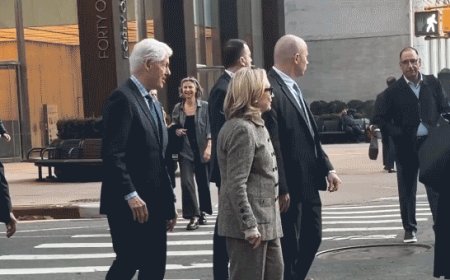 Hillary Clinton caught on video stepping back after pushy former president nudges her at busy NYC intersection