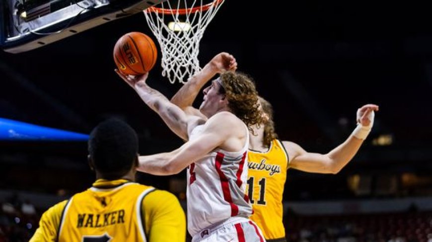 UNLV advances with 73-70 win over Wyoming