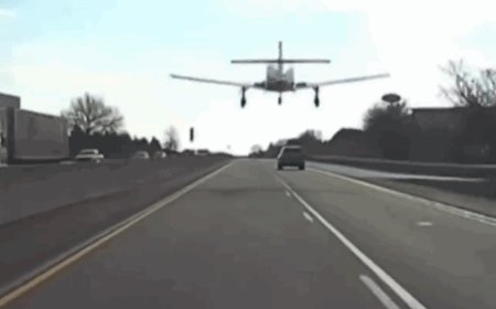 现实版GTA 美国一架飞机在公路上紧急迫降 后车拍下惊险全程