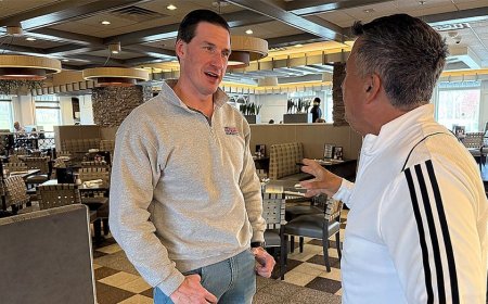 Republican seeks blue-state breakthrough, distances from Trump while taking aim at 'socialist'